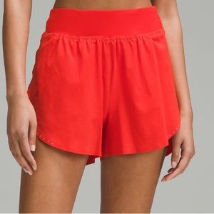 Orange lululemon fast and free shorts 3”